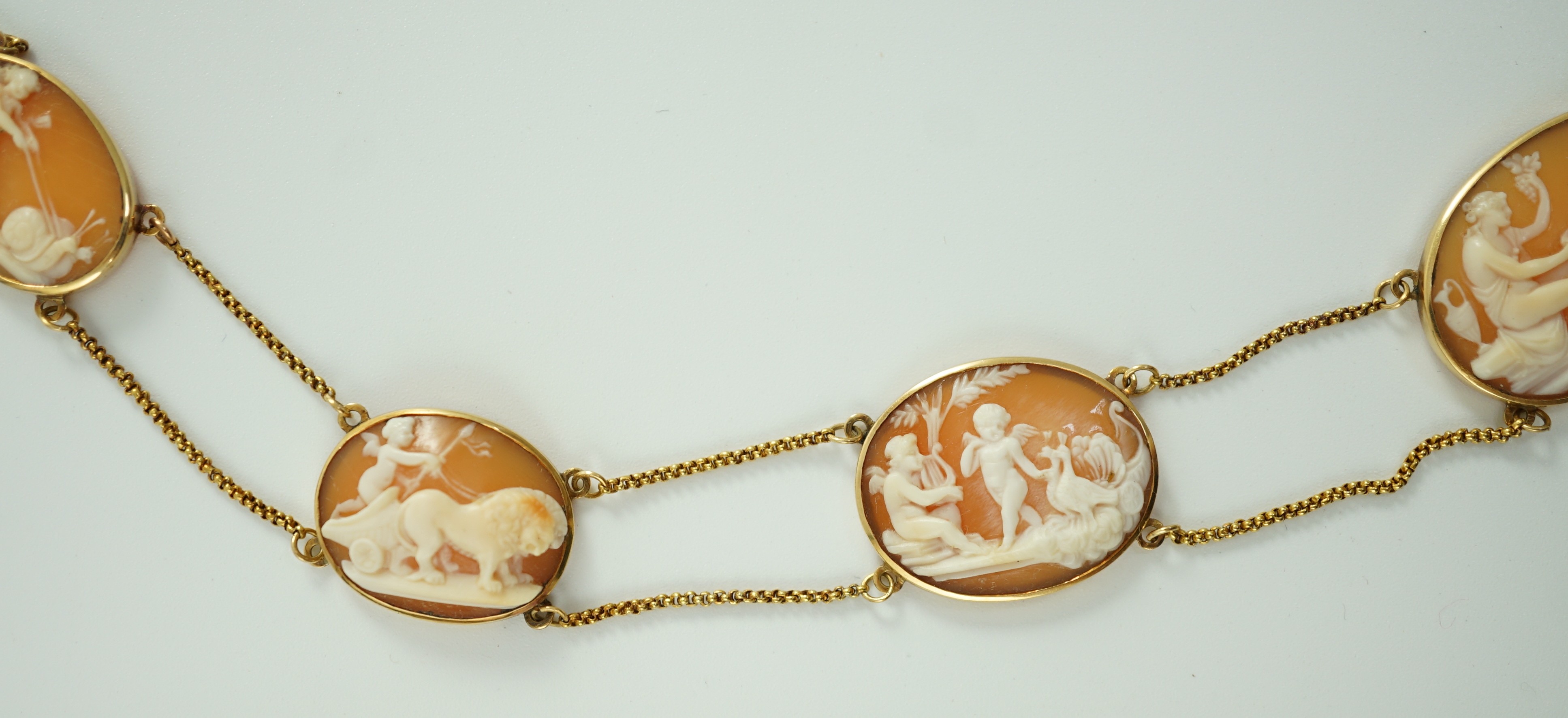 A late Victorian gold and graduated oval cameo shell necklace